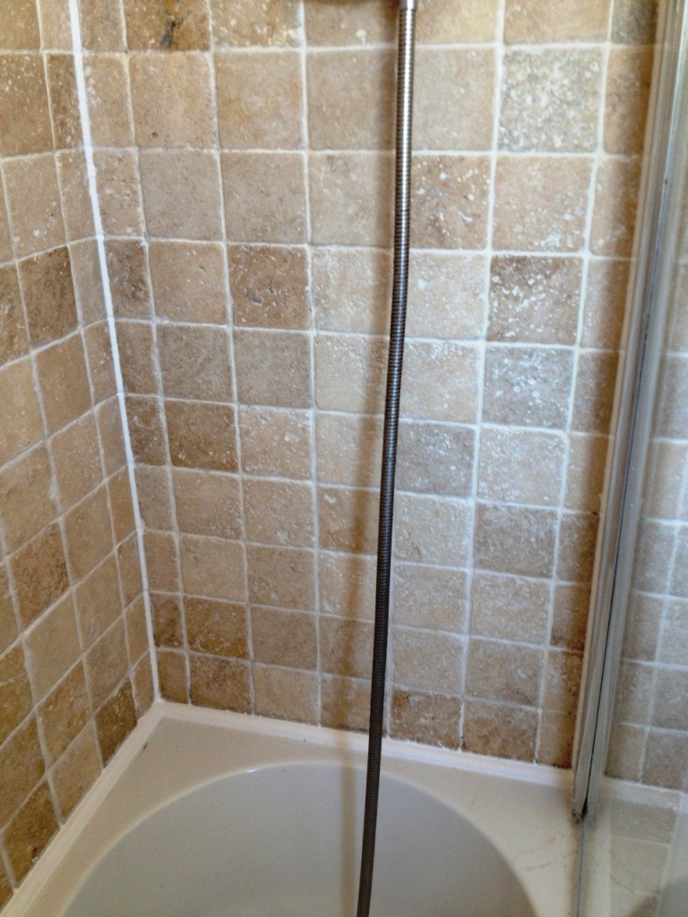 Filled Travertine Tiled Shower After Cleaning