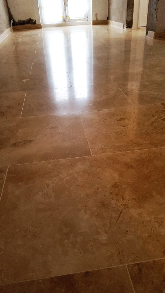 Uneven Travertine Floor After Levelling and Polishing in Swansea